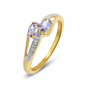 Bague Tanzanite et Diamant en Or Jaune 375. Cette bague en Or 375 est sertie de deux Tanzanites ovales. Chaque pierre mesu...