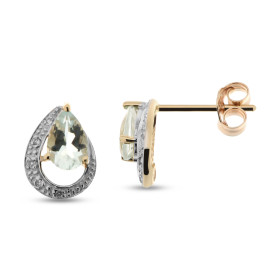 Boucles d oreilles Or Jaune 375 serties deux Aigues marines diamants Les Aigues Marines sont taillées poire mesurent 6x4mm...