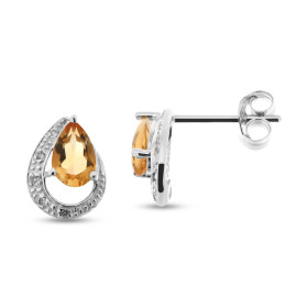 Boucles d oreilles Or Blanc 375 serties deux Citrines diamants Les Citrines sont taillées poire mesurent 6x4mm La forme gé...