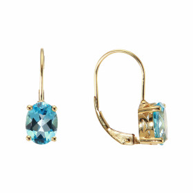 Boucles d oreilles dormeuses Or Jaune 375/1000 serties Topazes Bleues ovales 8x6mm Dimensions boucle : 6x18mm Système d at...