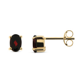 Puces d oreilles Grenat Or Jaune 375 Ces boucles sont serties pierres ovales 6x4mm La fermeture effectue par un système cl...