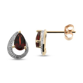 Boucles d oreilles Or Jaune 375 serties deux Grenats diamants Les Grenats sont taillés poire mesurent 6x4mm La forme génér...