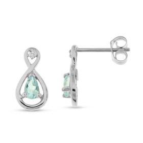  Boucles d oreilles Or blanc 375 serties d aigues marines poires 5x3mm 2 diamants Dimensions du motif (vue face) : 13x7mm ...
