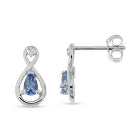 Boucles d oreilles Or blanc 375 serties tanzanites poires 5x3mm 2 diamants Dimensions du motif (vue face) : 13x7mm Poids D...