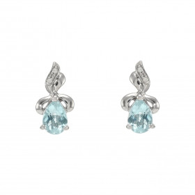 Boucles d oreilles Or Blanc 375 Topaze bleue traitée Poire 6x4mm Diamant Chaque boucle est sertie d une Topaze bleue trait...