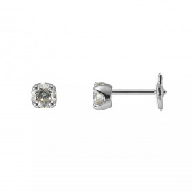 Boucles d&#39;oreilles en Or Blanc serties de deux diamants de 0.3 carat . Diamètre des pierres : 4.5mm. Système de sécuri...