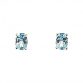 Boucles d oreilles Or Blanc 750 Topaze bleue traitée Ovale 7x5mm Boucles d oreilles type puces Or Blanc 750 Pierres ovales...