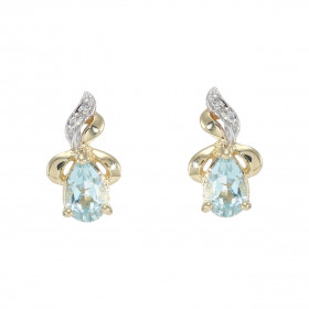 Boucles d oreilles Or Jaune 375 Topaze bleue traitée Poire 6x4mm Diamant Chaque boucle est sertie d une Topaze bleue trait...