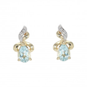 Boucles d'oreilles Or Jaune 375 Topaze bleue traitée Poire 6x4mm et Diamant. Chaque boucle est sertie d'une Topaze bleue t...