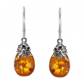 Boucles d'oreilles pendantes en argent composée d'une ambre en forme de goutte de10x15mm avec une petite abeille en argent...