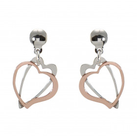 Boucles d'oreilles pendantes en argent et argent flashé or rose composées de 2 coeurs imbriqués. Dimension du motif : 15x1...