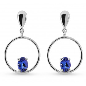 Boucles d&#39;oreilles pendantes en Or Blanc 750 et Tanzanites. Pierres ovales de 7x5mm. Poids total des Tanzanite : 1.6 c...