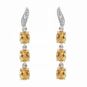 Boucles d oreilles Or blanc 375 serties 6 citrines ovales 4x3mm 2 diamants Longueur : 25mm Poids Diamant : 0,01 carats Qua...