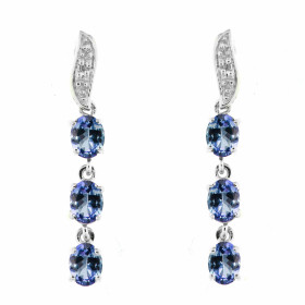 Boucles d oreilles Or blanc 375 serties 6 tanzanites ovales 4x3mm 2 diamants Longueur : 25mm Poids Diamant : 0,01 carats Q...