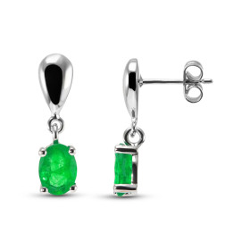  Boucles d oreilles pendantes Or Blanc 750 Emeraudes Ovales 7x5mm Pierres ovales 7x5mm Poids total des pierres : 1.3 carat...