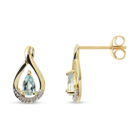 Boucles d'oreilles Pendantes Or jaune 375 Topaze Bleue et Diamant. Boucles d'oreilles en Or jaune 375 (9 carats). Motif se...