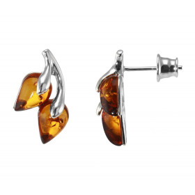 Boucles d'oreilles puces en argent en forme de branche avec 2 ambres qui forment les feuilles. Ambre de couleur cognac de ...