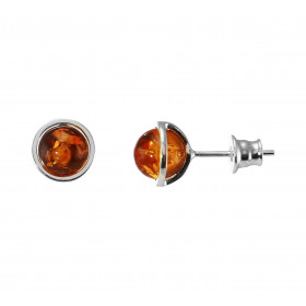 Boucles d'oreilles puces en argent composées d'une ambre couleur cognac de 6mm de diamètre et un entourage argent. Système...