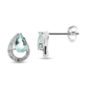 Boucles d oreilles Or Blanc 375 Topaze Bleue Traitée Diamant Les Topazes Bleues sont taillées poire mesurent 6x4mm La form...
