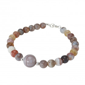 Bracelet Agate Botswana 6-10mm Argent Ce bracelet est composé pierres 6mm d une pierre 10mm son centre Elle est séparée pa...