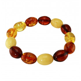 Bracelet en ambre sur un fil élastique. Ambre de couleur cognac,miel et jaune. Dimension des perles : 10x15mm. Longueur : ...