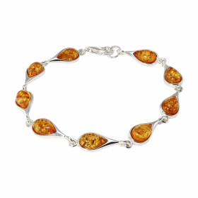 Bracelet en Argent 925 et Ambre couleur cognac. Pierres en forme de poires. Dimensions des pierres : 10x6mm. Longueur du b...