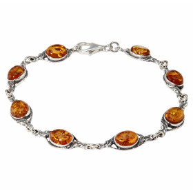 Bracelet en Argent 925 et Ambre couleur cognac. Pierres de forme ovale. Dimensions des pierres : 8x6mm. Longueur du bracel...