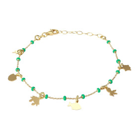 Bracelet en argent doré composé de breloques représentant les animaux de la mer et de perles en laque verte. Chaîne maille...