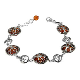 Bracelet en argent composé d&#39;ambres de 13mm de diamètre avec au dos un arbre de vie. Ambre de couleur cognac. Longueur...