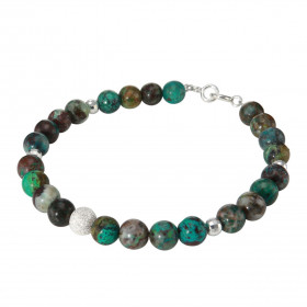 Bracelet Chrysocolle 6mm et Argent. Ce bracelet est composé de pierres de 6mm, de 4 perles facettées en Argent de 4mm de d...