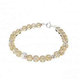 Bracelet Citrine 6mm et Argent. Ce bracelet est composé de pierres de 6mm, de 4 perles facettées en Argent de 4mm de diamè...