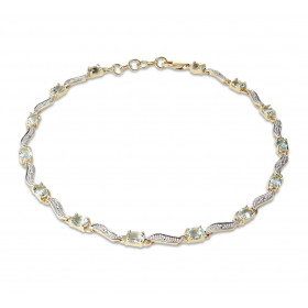 Bracelet Or Jaune 375 2 tons Aigues Marines Ce bracelet est serti 14 aigues marines ovales 4x3mm espacées par des motifs o...