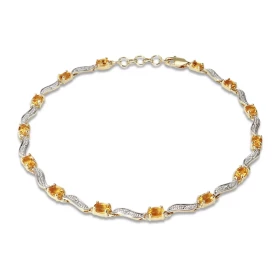 Bracelet Or Jaune 375 2 tons Citrine Ce bracelet est serti 14 citrines ovales 4x3mm espacées par des motifs ondulés Longue...