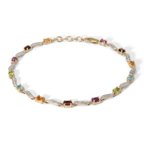  Bracelet Or Jaune 375 2 tons Pierres fines Ce bracelet est serti pierres fines ovales 4x3mm espacées par des motifs ondul...