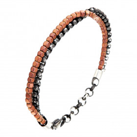 Bracelet homme en acier composé d'une chaîne en acier vieilli et une chaîne avec des perles cubiques en acier cuivré. Larg...