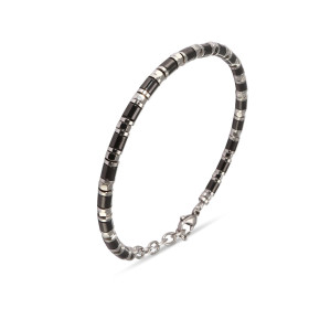 Bracelet souple composé de maillons gris et noirs, offrant une esthétique moderne et un confort de port. Longueur ajustabl...