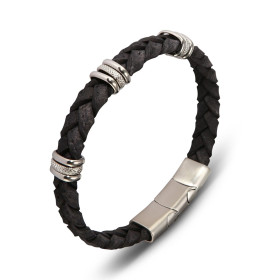 Bracelet homme en cuir noir tressé et texturé composé de 6 anneaux acier lisses et 3 anneaux acier quadrillés. Largeur du ...