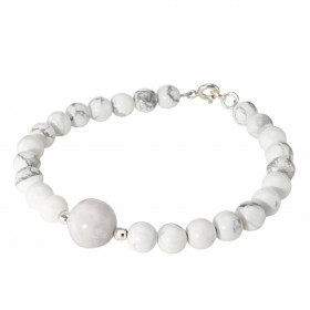 Bracelet Howlite 6-10mm Argent Ce bracelet est composé pierres 6mm d une pierre 10mm son centre Elle est séparée par 2 per...