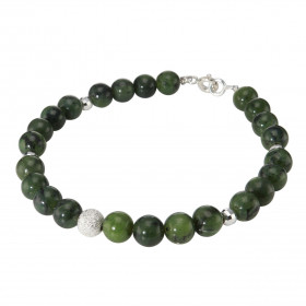 Bracelet Jade 6mm et Argent. Ce bracelet est composé de pierres de 6mm, de 4 perles facettées en Argent de 4mm de diamètre...