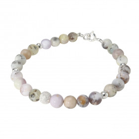 Bracelet Opale 6mm Argent Ce bracelet est composé pierres 6mm, 4 perles facettées Argent 4mm diamètre d une perle argent m...