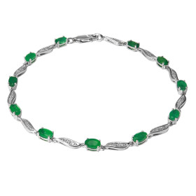 Bracelet Or Blanc 750 Emeraudes Ovales Diamant Bracelet composé d émeraudes ovales 5x3mm serties à griffes diamants sertis...