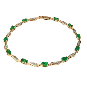 Bracelet Or Jaune 750 Emeraudes Ovales Diamant Bracelet composé d émeraudes ovales 5x3mm serties à griffes diamants sertis...