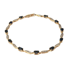 Bracelet Or Jaune 750 Saphirs Ovales Diamant Bracelet composé saphirs ovales 5x3mm sertis à griffes diamants sertis dans u...