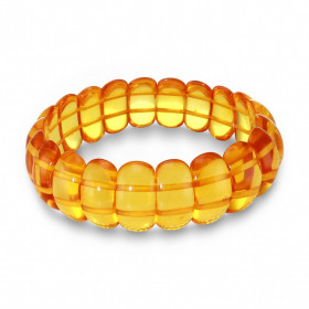 Bracelet Plaquettes Ambre 16.5mm x 18cm Ambre couleur cognac Enfilage sur élastique double Largeur : 16.5mm Longueur : 18c...