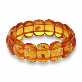 Bracelet Plaquettes Ambre 19.5mm x 18cm. Ambre couleur cognac. Enfilage sur élastique double. Largeur : 19.5mm. Longueur :...