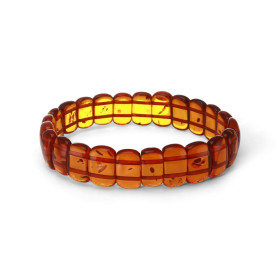 Bracelet Plaquettes Ambre couleur cognac 15mm x 18.8cm Ambre couleur cognac Enfilage sur élastique double Largeur : 15mm L...