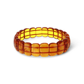 Bracelet Plaquettes Ambre couleur cognac 15mm x 18.8cm Ambre couleur cognac Enfilage sur élastique double Largeur : 15mm L...