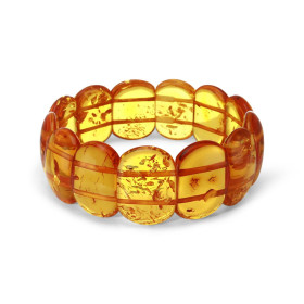 Bracelet Plaquettes Ambre couleur miel 23mm x 18.2cm Ambre couleur miel Enfilage sur élastique double Largeur : 23mm Longu...