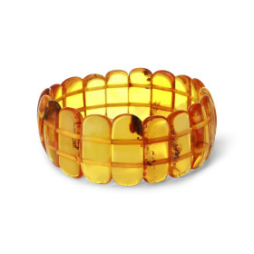 Bracelet Plaquettes Ambre couleur miel 24mm x 18.2cm Ambre couleur miel Enfilage sur élastique double Largeur : 24mm Longu...