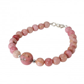 Bracelet Rhodonite 6-10mm et Argent. Ce bracelet est composé de pierres de 6mm et d'une pierre de 10mm en son centre. Elle...